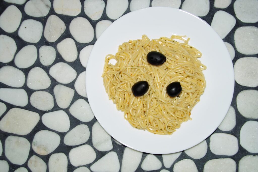 pasta, olives, plate, mosaic, river rock, white, black, caulk, stone, tile, natural, rocks, food