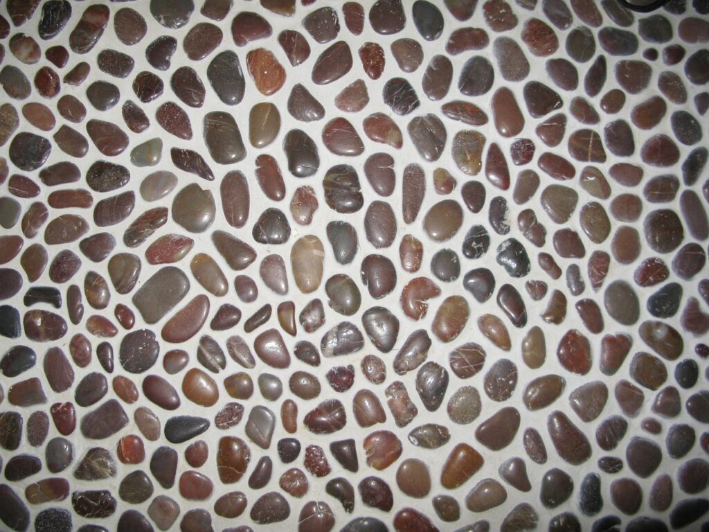 river rock, brown, white, caulk, mosaic, tile, natural, rocks, river, bathroom, tiling, flooring, gray bathroom