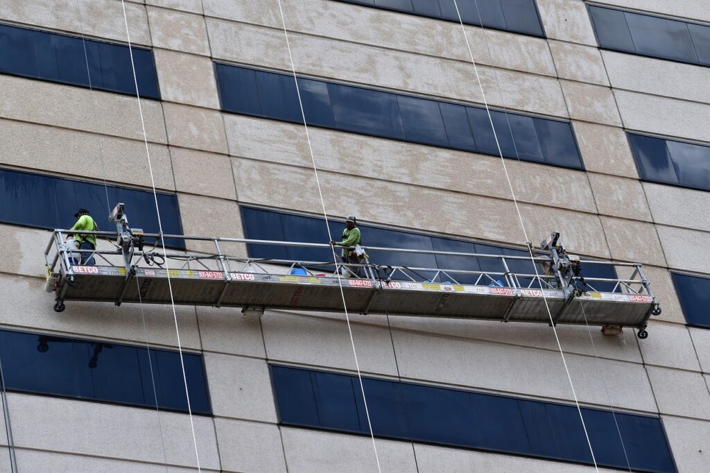 scaffolding, waterproofing, exterior building maintenance crew, fearless dangerous hard work, harness, secure tether, scaffold, construction team, expert contractor, leverage, balance, occupational hazard, spray bottle, florescent colors, safety equipment, houston texas, intense inspiration, strong men together, mexican worker, trusted teamwork, florescent neon, bright colors, bold and courageous, three men, puli, waterproofing, waterproofing, waterproofing, waterproofing, waterproofing, leverage
